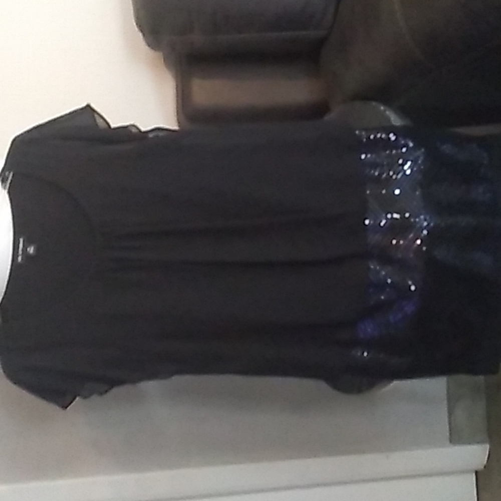Never worn black with sequin section on bottom size 10